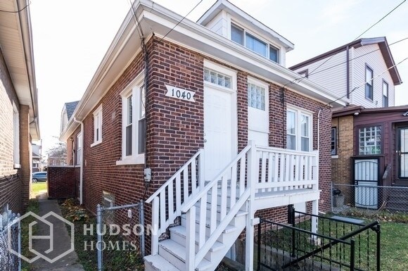Building Photo - 1040 W 92nd Pl