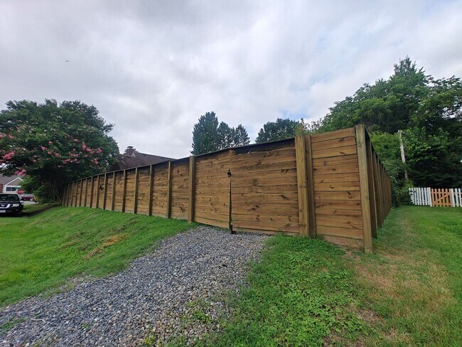 Building Photo - corner lot home with fenced rear yard