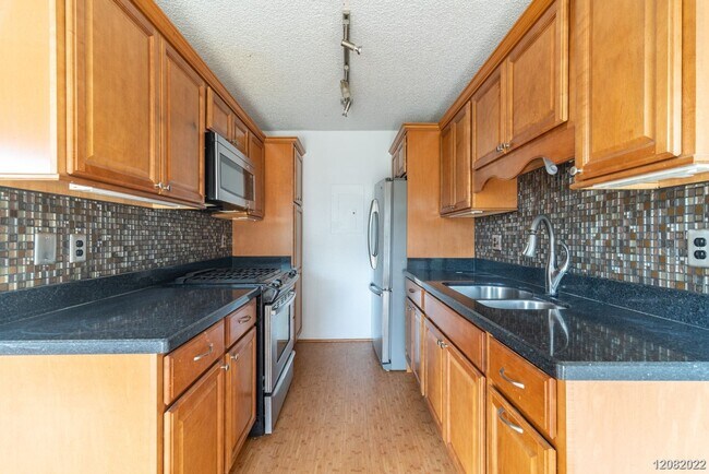 Foto del edificio - 2bd 1.5 ba 2 pkg townhome at Palm Villas g...