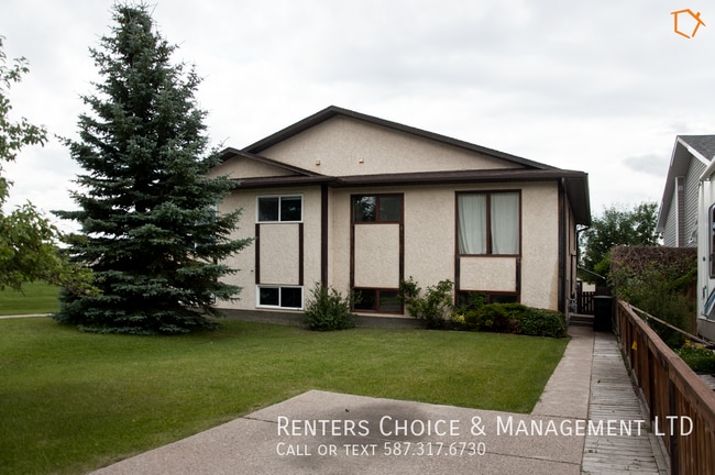 Building Photo - Roomy Half Duplex Near Schools & Amenities