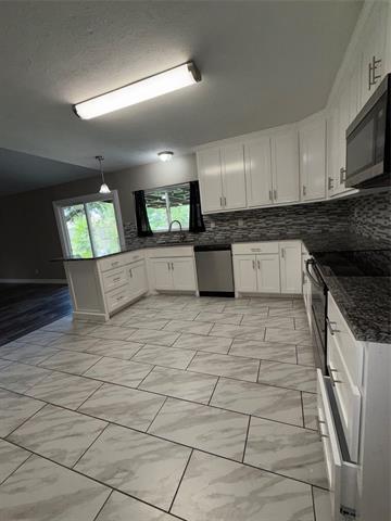 Building Photo - 6809 Greenspring Dr