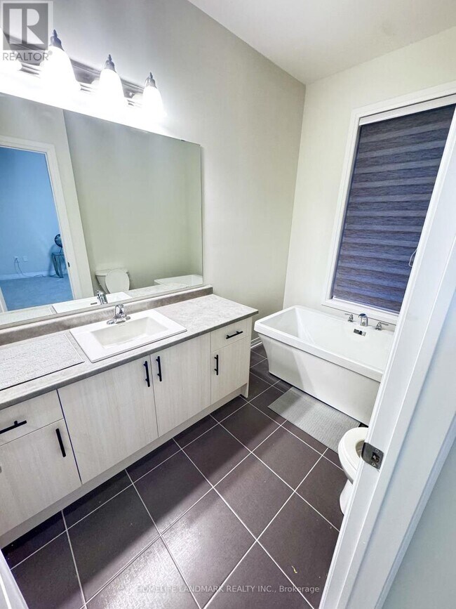 Photo du bâtiment - 64 Millman Ln