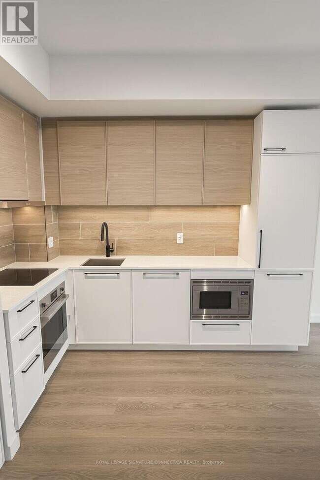 Photo du bâtiment - 1050 Eastern Ave