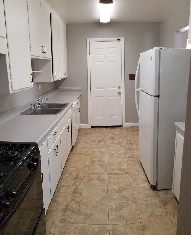 Building Photo - COMING SOON....NICE 4 BED 2 BATH CORNER LO...
