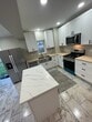 Outstanding kitchen with center island - 288 W Commercial Ave