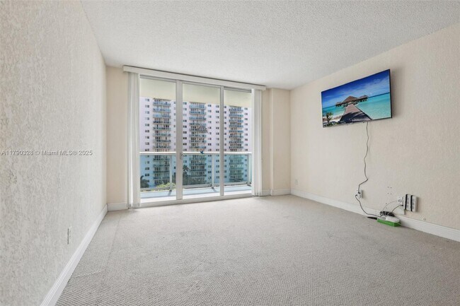 Building Photo - 19390 Collins Ave