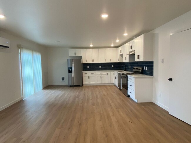 Building Photo - New! New! New! Newly built Duplex style ho...