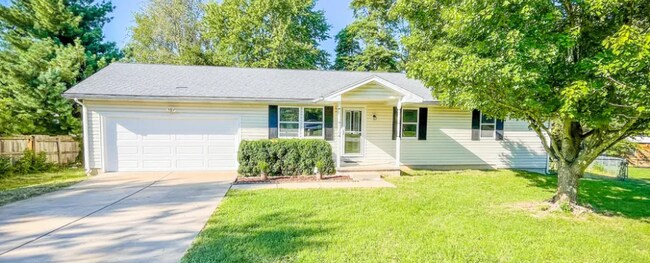 Frente - 202 S Poplar Ct
