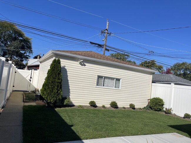 Fenced backyard - 3306 N Ozark Ave