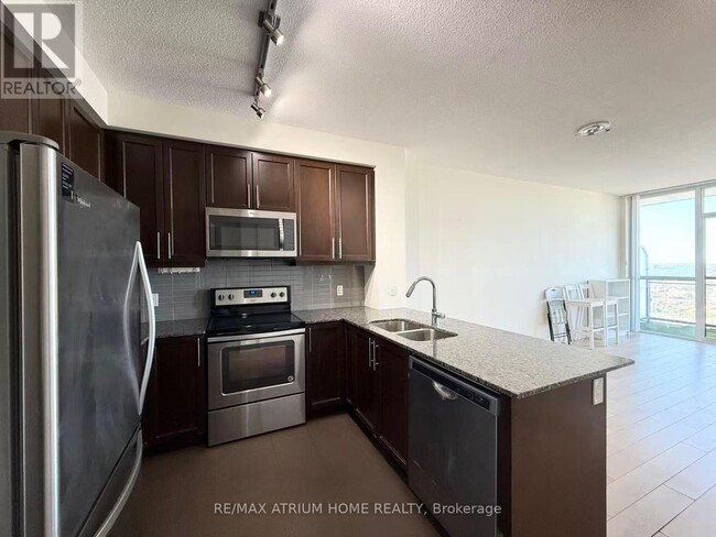 Building Photo - 3975-3975 Grand Park Dr