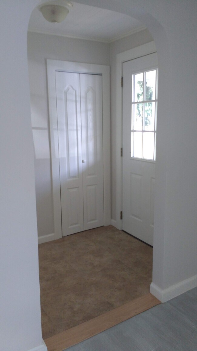 Spacious entry with double deep coat closet. - 181 W Seneca St