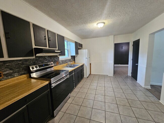 Foto del edificio - 4 Bedroom