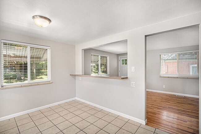 Building Photo - Spacious 4BR with bonus space and a 2 car ...