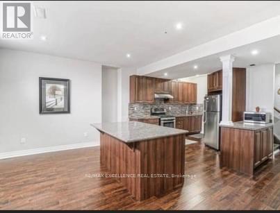 Photo du bâtiment - 28 Midsummer Dr