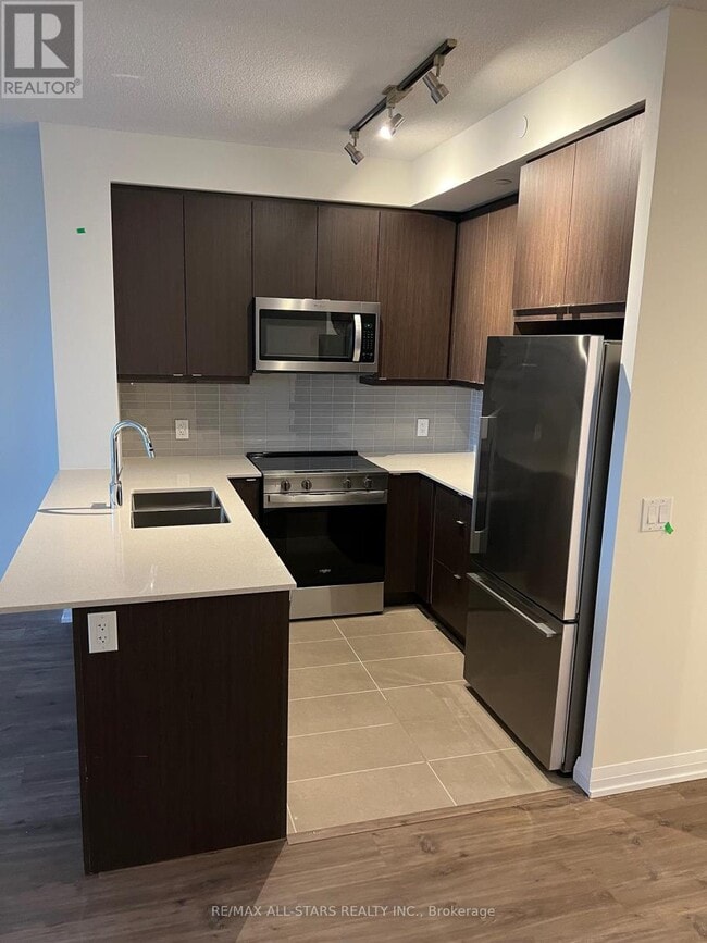 Building Photo - 3270 Sheppard Ave E