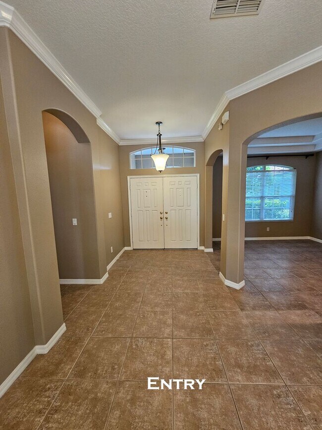 Foto del edificio - Elegant 5-Bed, 3.5-Bath Pool Home in Lake Mary’s Exclusive Magnolia Plantation – Guard Gated Luxury!