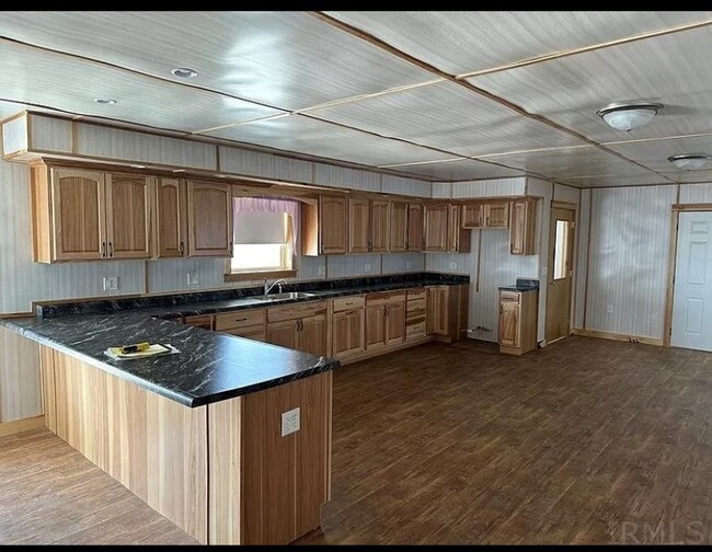 Kitchen. Long section of cabinets is 19’ long - 2499 S US Highway 27