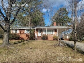 Building Photo - 1225 Poplar Ave
