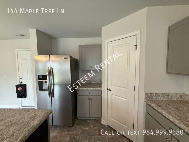 Foto del edificio - 144 Maple Tree Ln