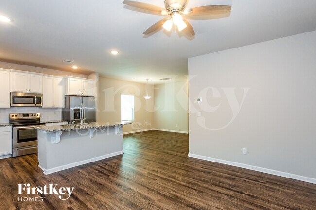 Foto del edificio - 10724 Rivergate Dr NW