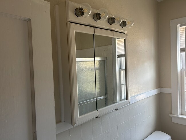 Vanity cabinet with lights - 208 Circular Rd