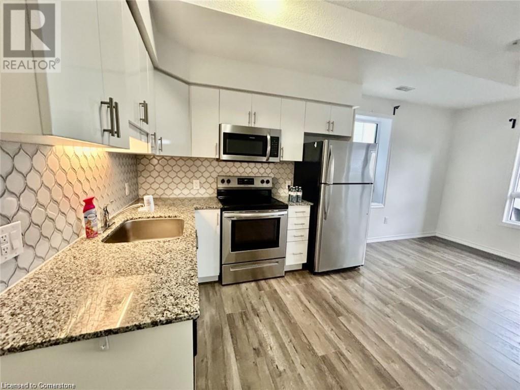Photo principale - 1430 Highland Rd W