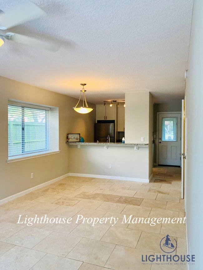 Building Photo - Walk To The Beach From This Beautiful Updated Townhome