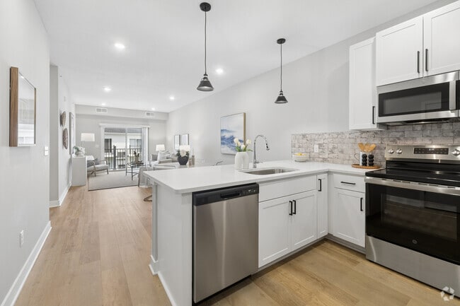3BR, 2BA - 1,450SF - Kitchen, Dining Room and Living Room - Oneka Fields Townhomes