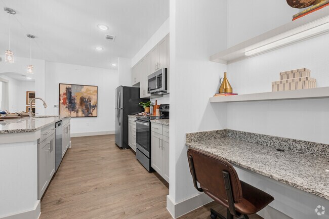 1 BR  1 BA, 975 Sq. Ft. - Desk/Kitchen - Corban Discovery