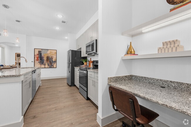 1 BR  1 BA, 975 Sq. Ft. - Desk/Kitchen - Corban Discovery