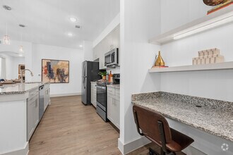 1 BR  1 BA, 975 Sq. Ft. - Desk/Kitchen - Corban Discovery