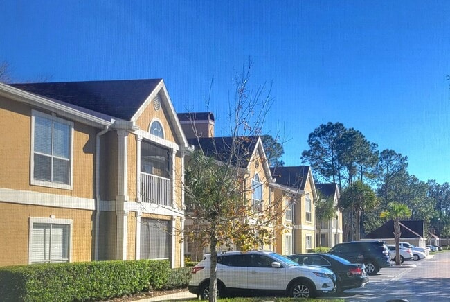 Building Photo - 9481 Highland Oak Dr