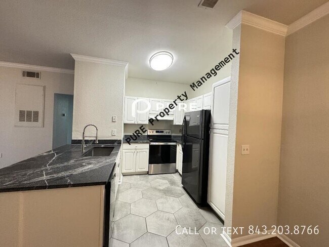 Building Photo - 3 bed FIRST FLOOR ADA condo Available Now ...