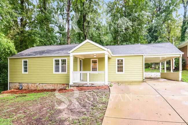 Building Photo - Beautiful 3BR 2BA home nestled in the woods