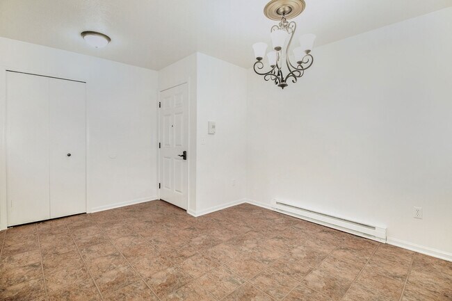 Foyer and dining room with coat closet - 4295 Cemetery Rd