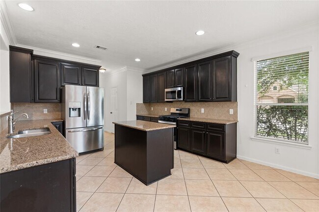 Foto del edificio - 4203 Middleoak Grove Ln