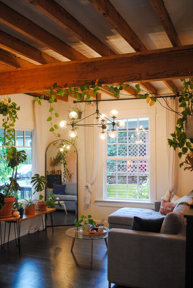 One of our favorite features is our massive arched floor mirror from West Elm. - 5233 NE 18th Ave