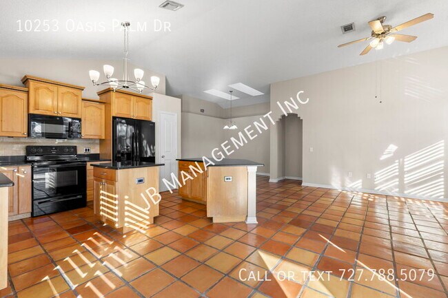 Building Photo - 10253 Oasis Palm Dr