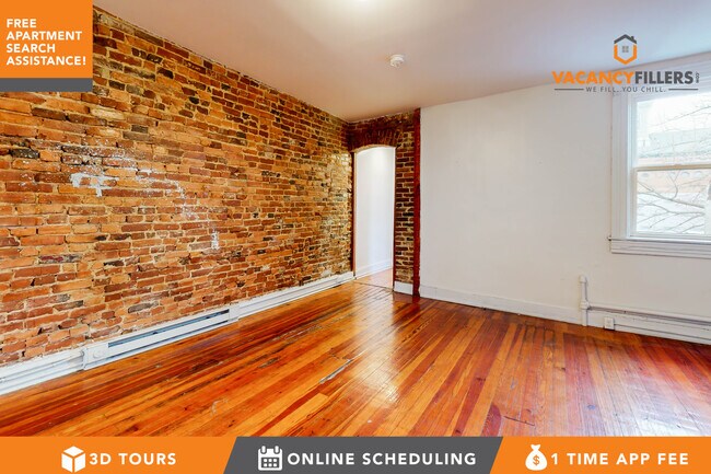 Building Photo - MASSIVE 1 Bedroom in Central Charles Village!