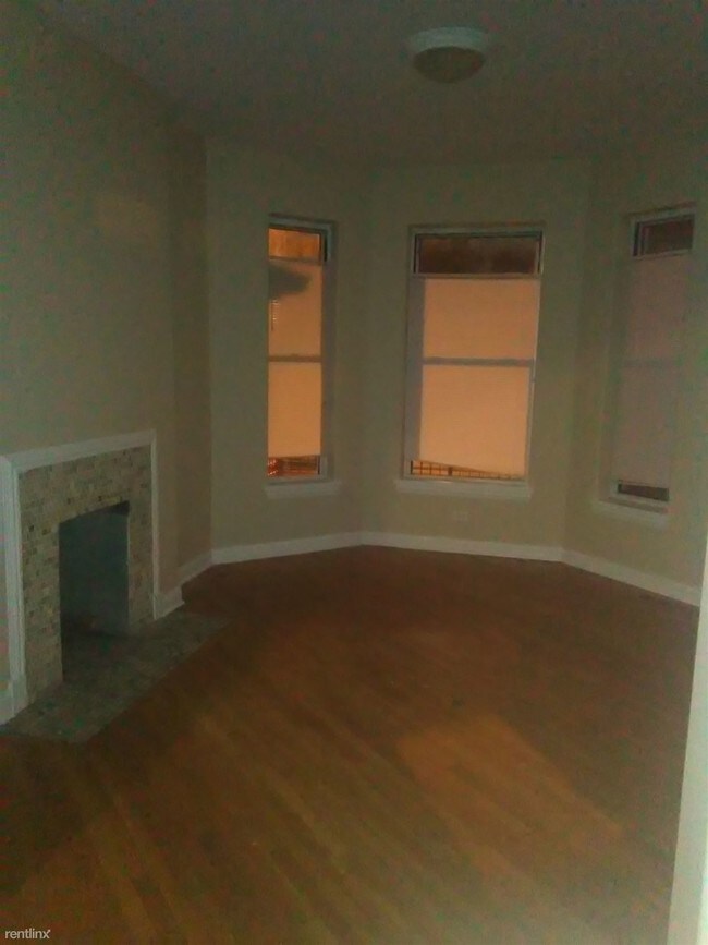 Building Photo - 6409 S Rhodes Ave