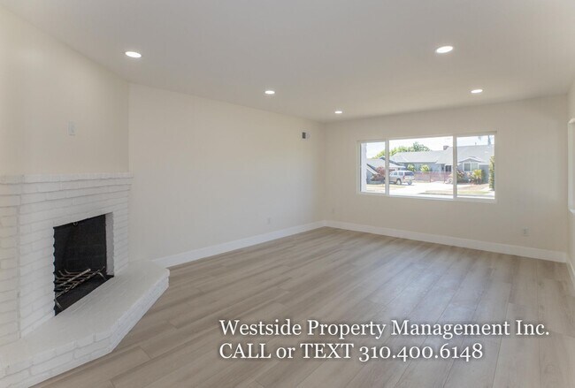 Building Photo - 5838-5840 S. Chariton Ave.