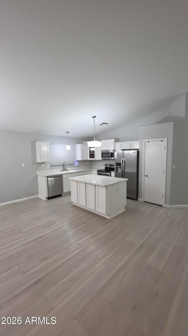 Building Photo - 13201 W Mauna Loa Ln