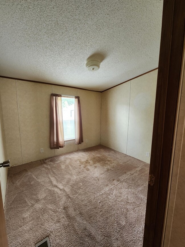 Building Photo - 3024 E 13th Ct