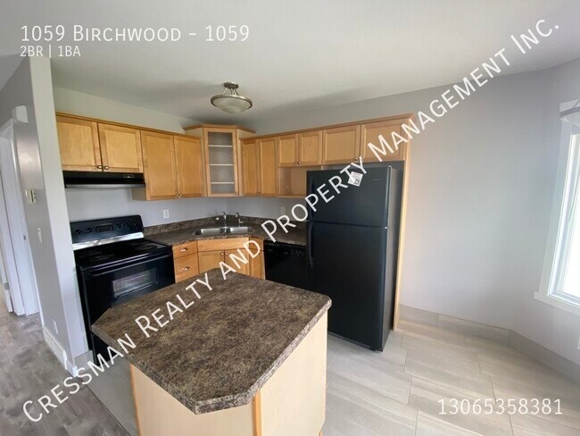 Building Photo - Upper level condo in South Regina