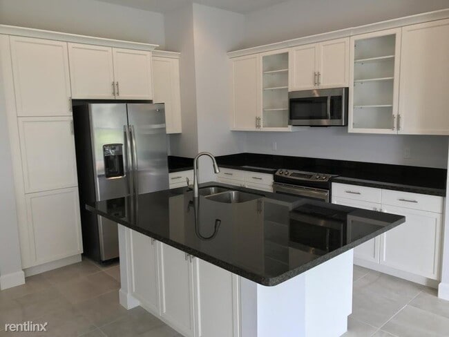 Building Photo - 3 br, 2.5 bath House - 6640 Quiet Wave Trl...