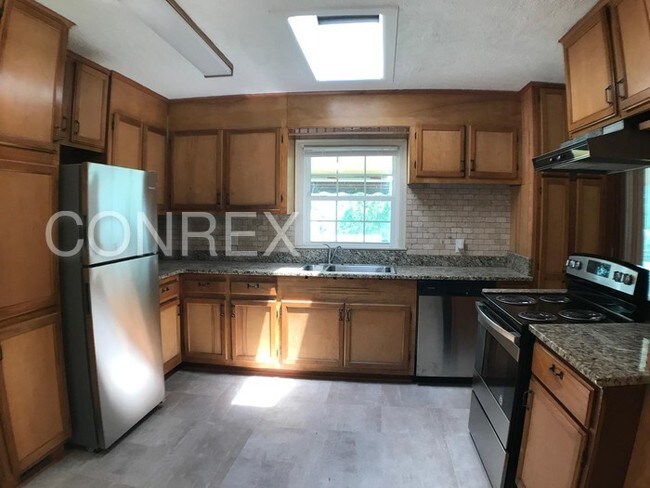 Building Photo - Big Space for a Small Price!