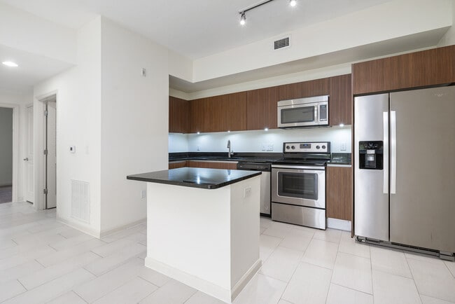 The perfect blend of function and style with a kitchen island - Doral View