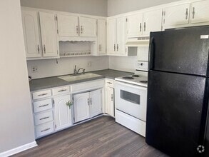 Building Photo - 202-208 S Sugar Creek Blvd