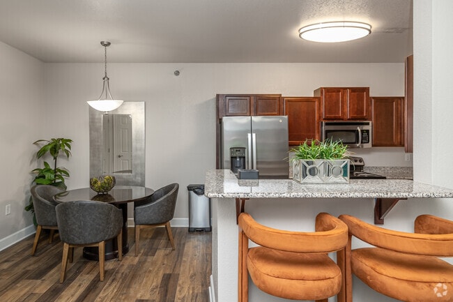 2BR, 2BA - 1,022SF - Kitchen and Dining Area - The Pointe Conway