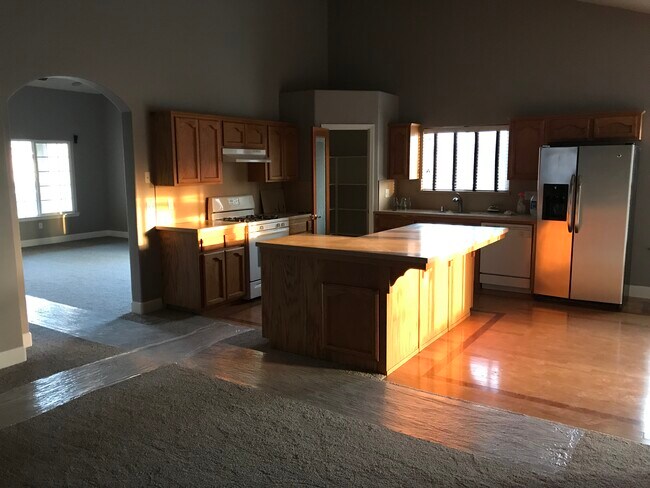 Kitchen and pantry. Refinished cabinets and hardwood - 445 S 19th Ave